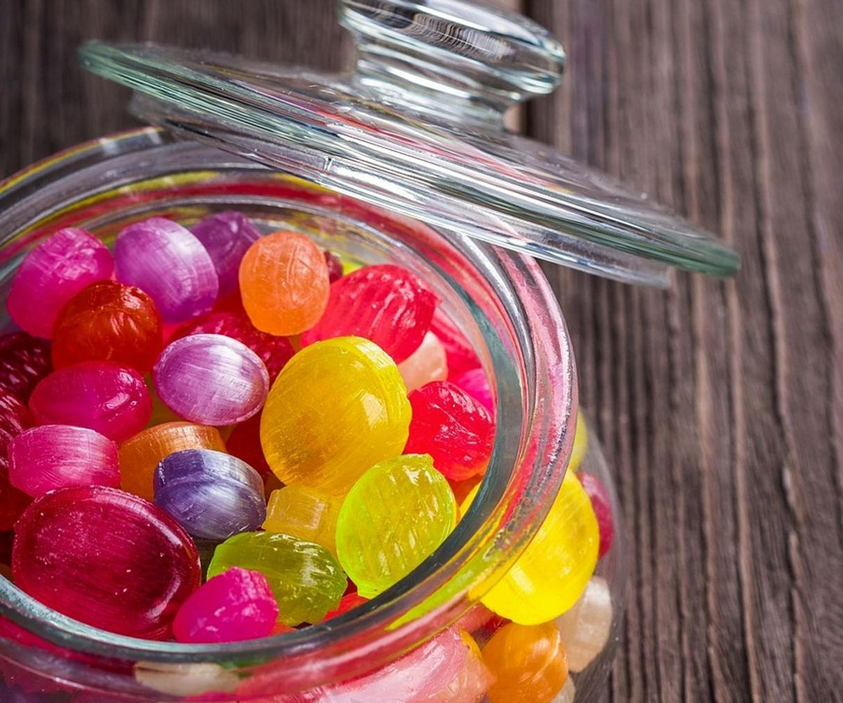Display cases filled with colorful confectionery and artisan chocolate